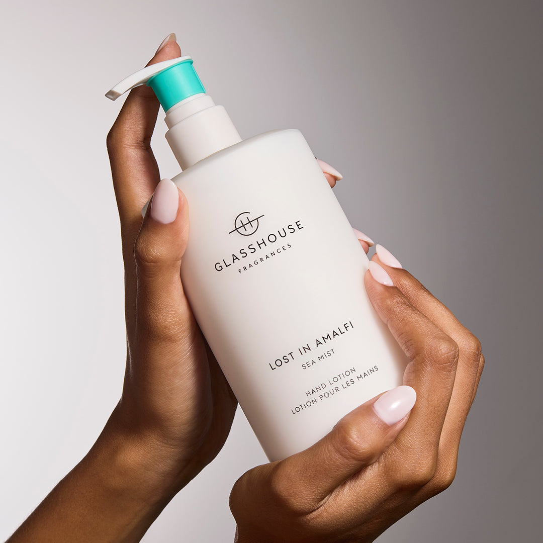 Glasshouse Fragrances Lost In Amalfi Hand Lotion close up in hands.
