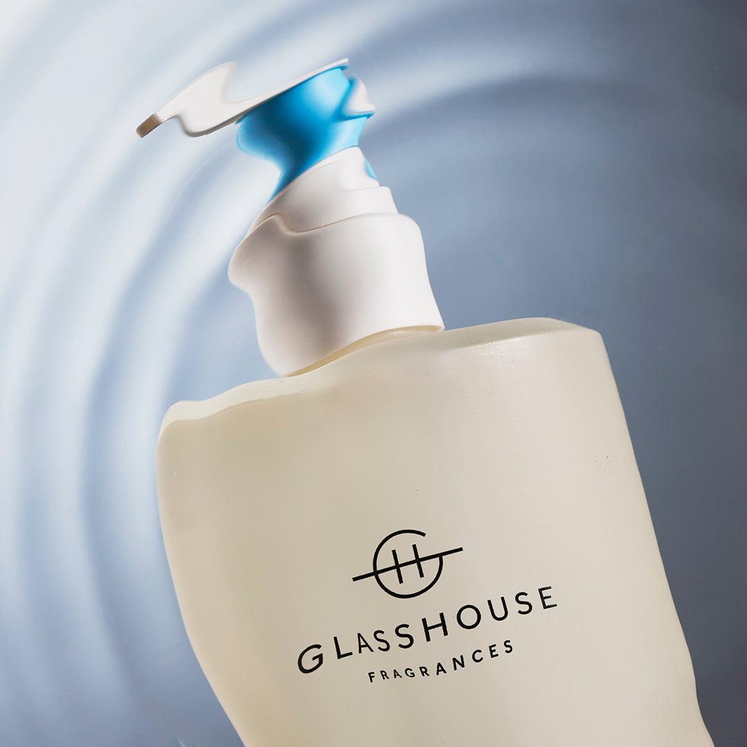 Glasshouse Fragrances close up of The Hamptons Hand Wash submerged in water.